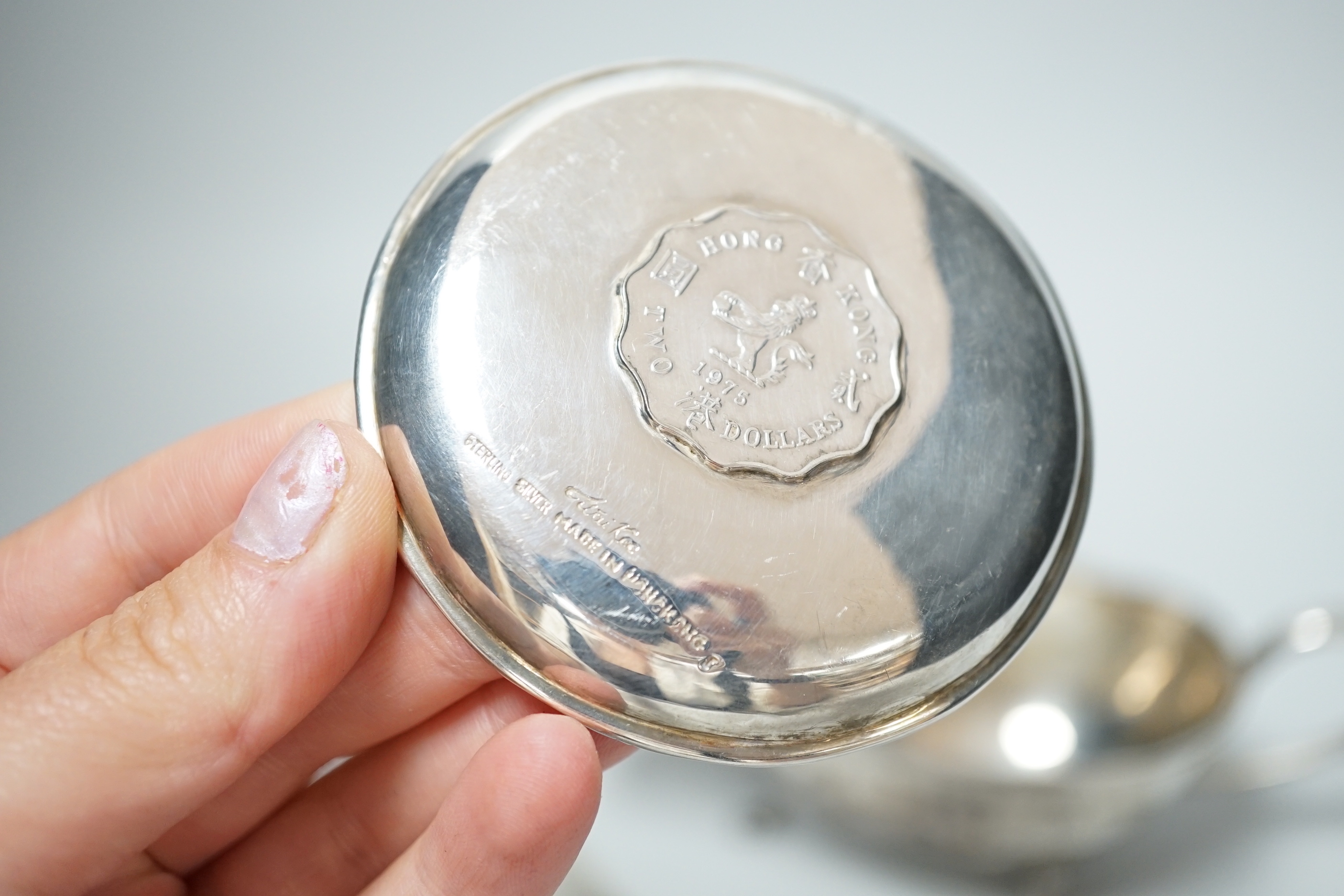 A Victorian silver tureen and cover, with hand holding crown finial and stylised anthemion engravings, makers initials W.T, London 1867, 23cm over handle, 673 grams